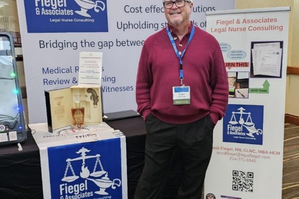 Driller Fiegel – Fiegel & Associates COO at the legalfiegel.com exhibition booth